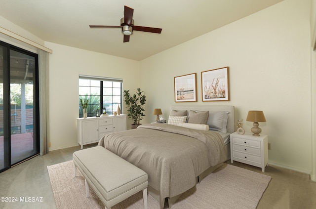 bedroom featuring ceiling fan, light carpet, and access to exterior