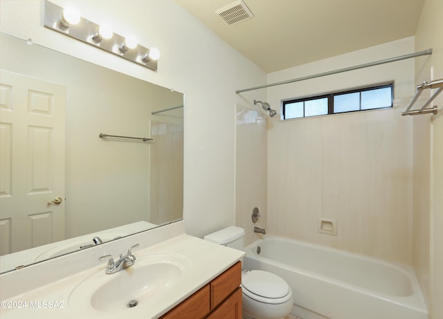 full bathroom with shower / bathing tub combination, vanity, and toilet