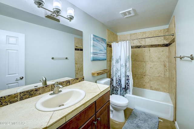 full bathroom with vanity, shower / tub combo, toilet, and tile patterned floors