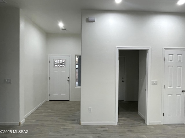 hallway featuring light wood-type flooring