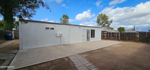 back of house featuring a patio area