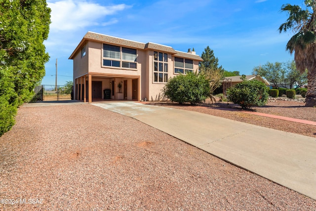 view of front facade featuring a carport