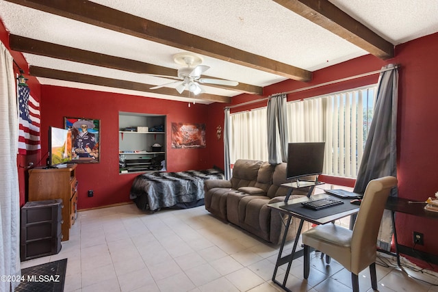 living room with ceiling fan, beamed ceiling, a textured ceiling, and light tile patterned floors