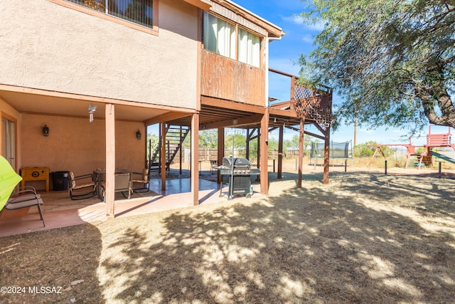 view of patio with a playground