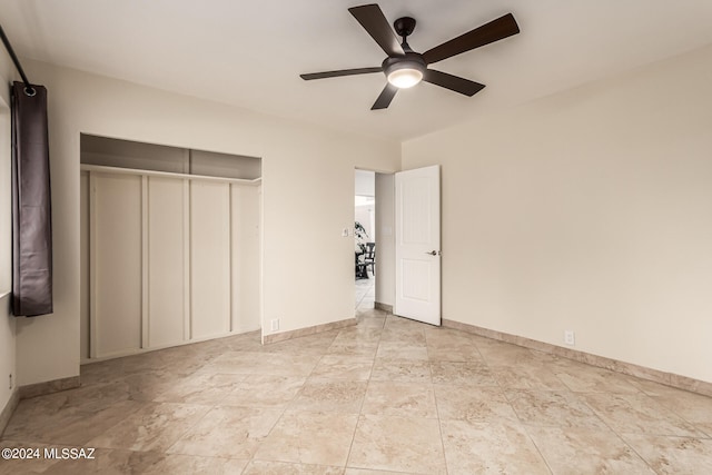 unfurnished bedroom with a closet and ceiling fan