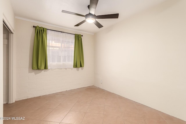 5731 E 2nd St, Tucson, AZ 85711 - unfurnished room with light tile patterned floors and ceiling fan