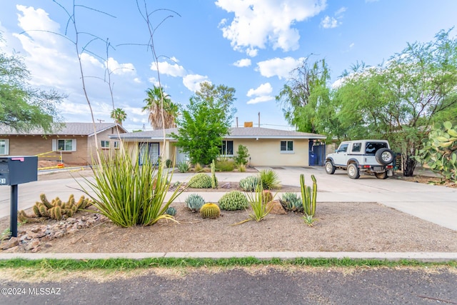 5731 E 2nd St, Tucson, AZ 85711 - single story home featuring driveway