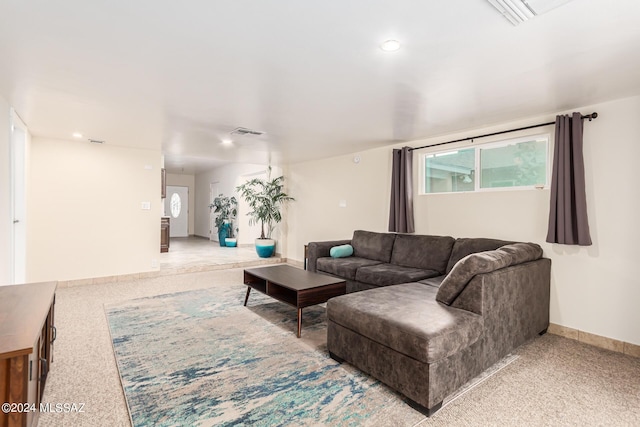 5731 E 2nd St, Tucson, AZ 85711 - living area featuring light colored carpet, visible vents, baseboards, and recessed lighting