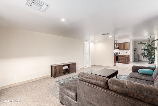 living room with light colored carpet