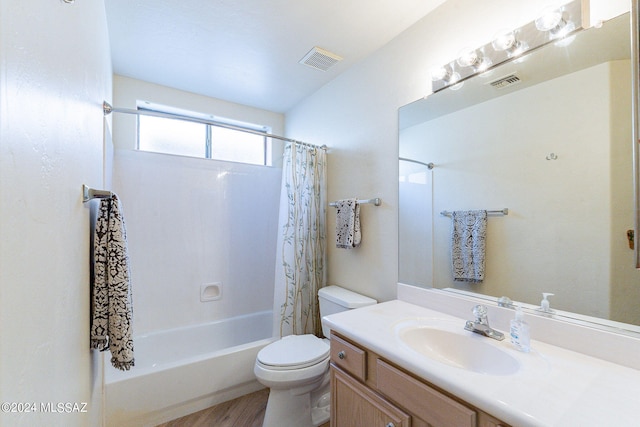 full bathroom featuring toilet, shower / tub combo with curtain, vanity, and wood-type flooring