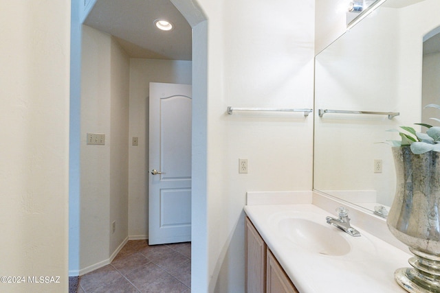 bathroom featuring vanity and tile patterned flooring