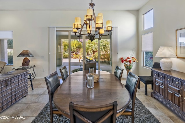 dining area featuring a chandelier