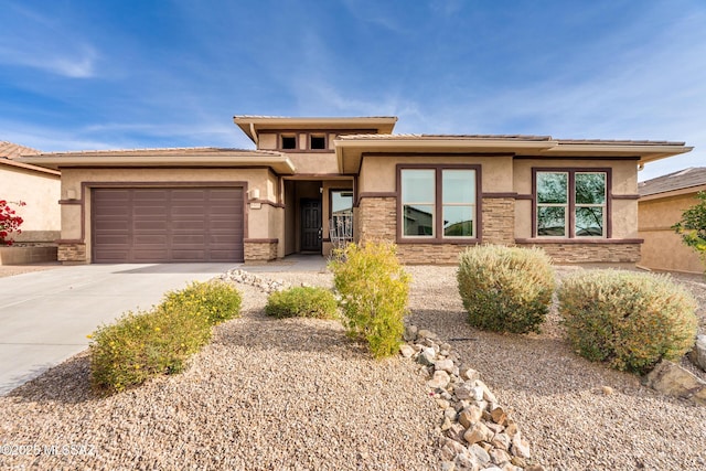 prairie-style home with a garage