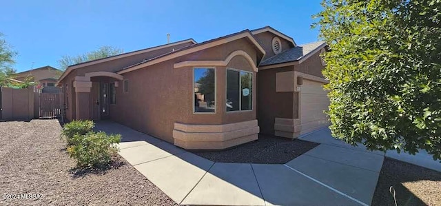 view of front of home featuring a garage