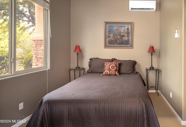 bedroom featuring a wall mounted AC