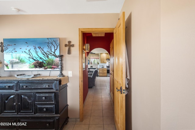 hallway featuring tile patterned floors