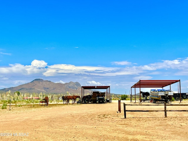 surrounding community with a mountain view and a rural view