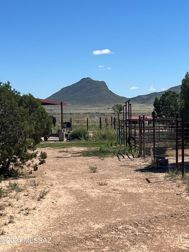 property view of mountains featuring a rural view