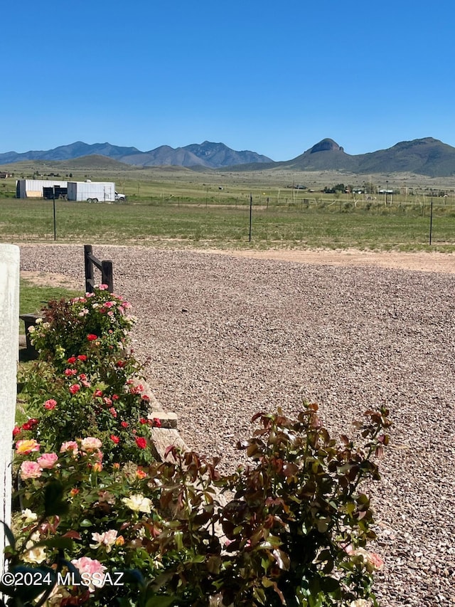 view of mountain feature featuring a rural view