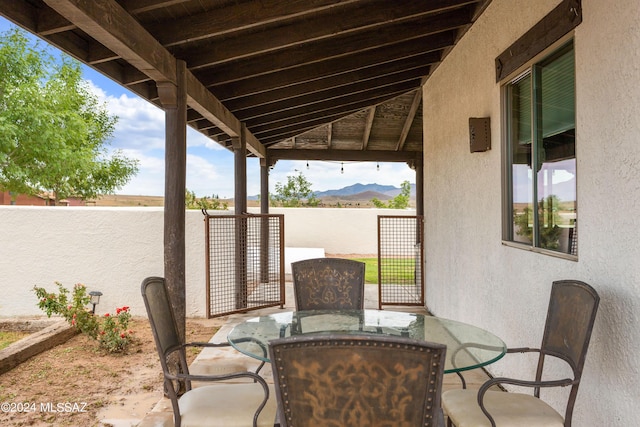 view of patio / terrace with a mountain view