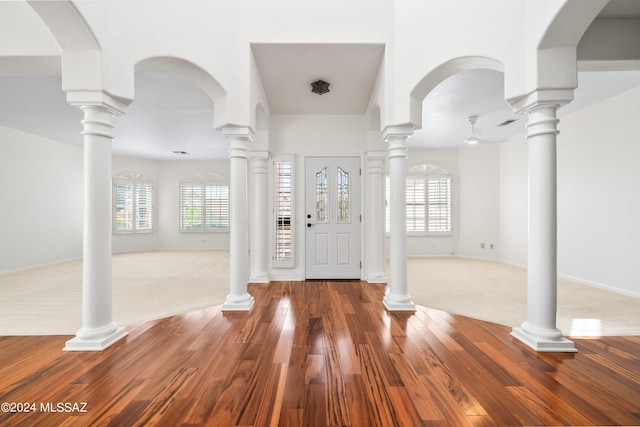 entrance foyer featuring carpet