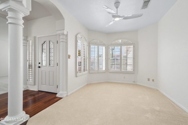 entryway featuring a chandelier, a textured ceiling, and dark hardwood / wood-style floors