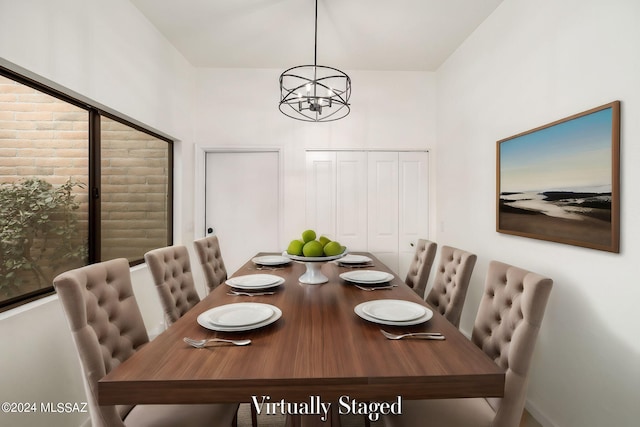 dining room featuring a chandelier