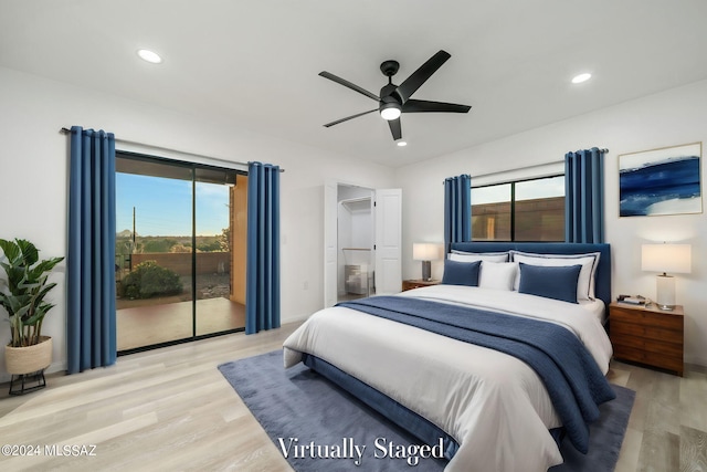 bedroom featuring access to exterior, ceiling fan, and light hardwood / wood-style floors