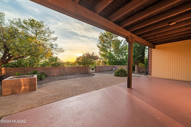 view of patio terrace at dusk