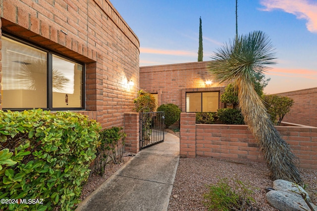 view of property exterior at dusk