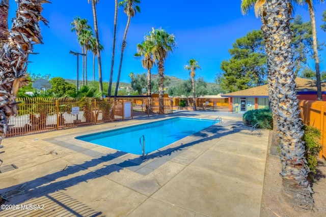 view of pool featuring a patio area