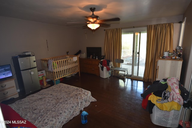 bedroom with ceiling fan, access to exterior, and dark hardwood / wood-style flooring