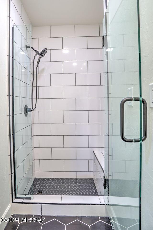 bathroom featuring walk in shower