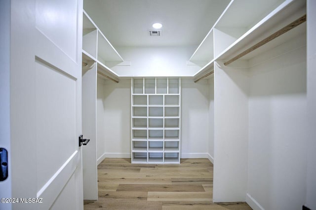 walk in closet featuring light wood-type flooring