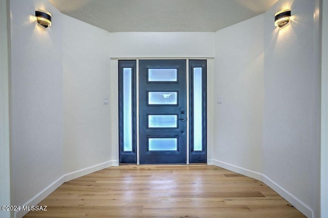 foyer featuring light hardwood / wood-style floors