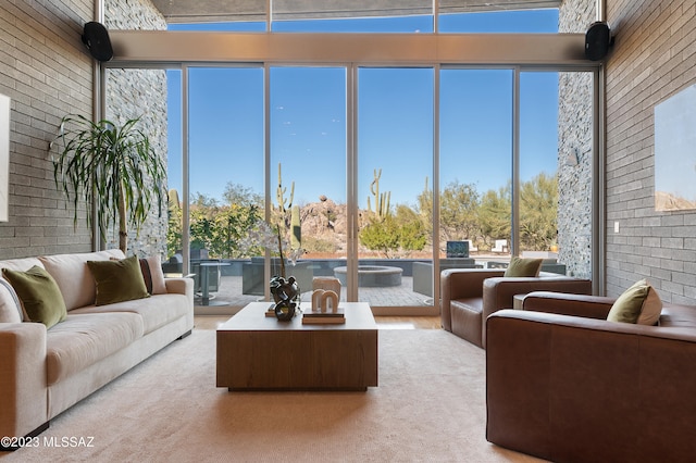 sunroom / solarium featuring a wealth of natural light