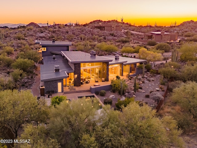 view of aerial view at dusk