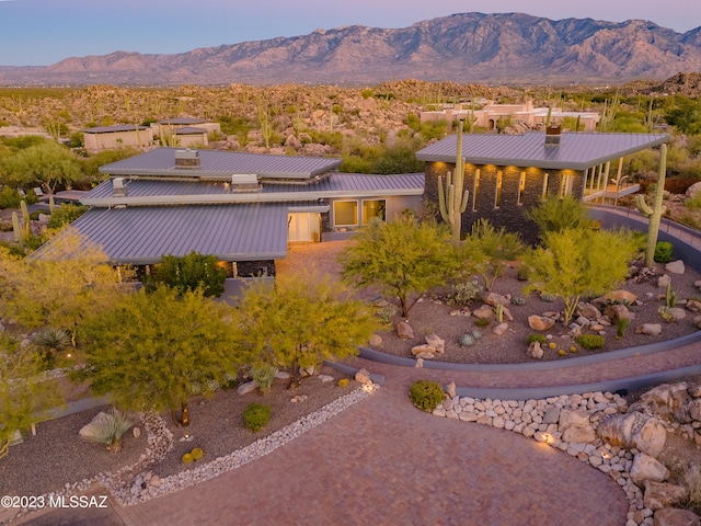 exterior space featuring a mountain view