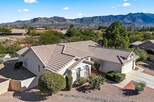 drone / aerial view featuring a mountain view