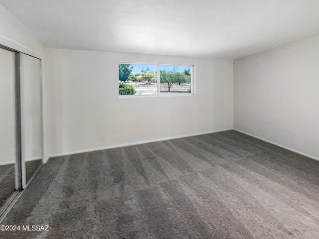 interior space with dark carpet