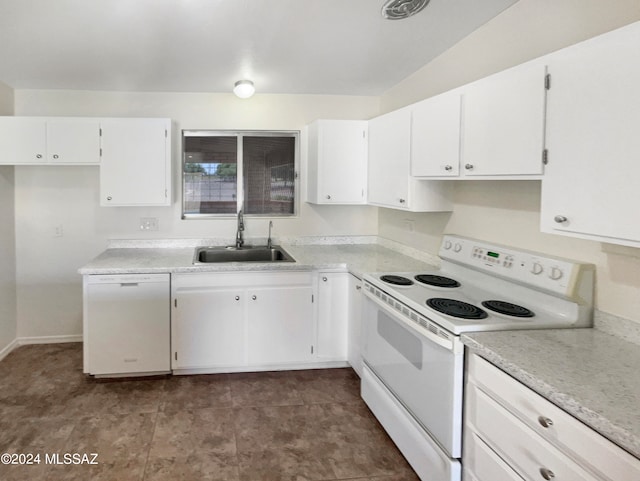 kitchen featuring white cabinetry, white appliances, and sink