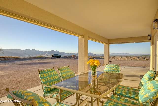 view of patio / terrace with a mountain view