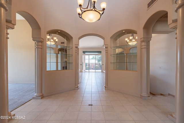 hallway featuring light tile patterned floors