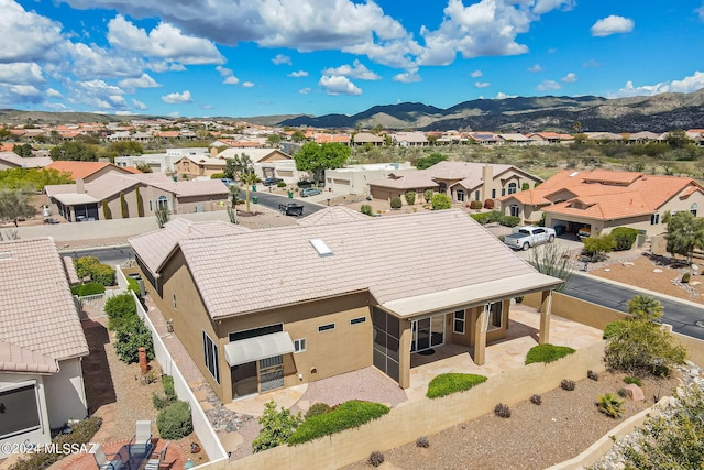 bird's eye view with a mountain view