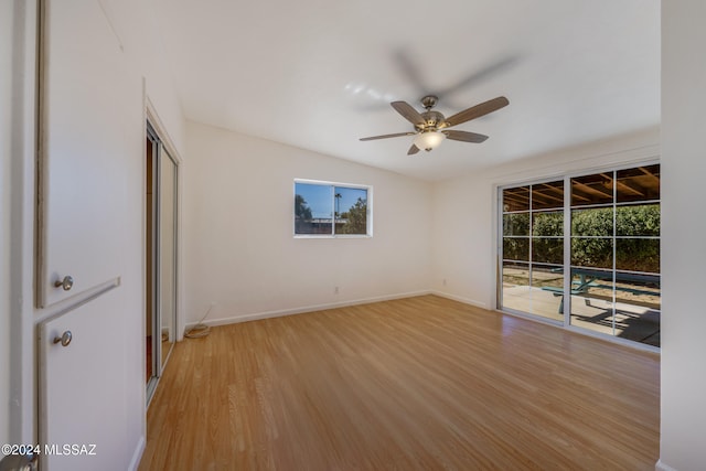 empty room featuring light hardwood / wood-style floors and ceiling fan