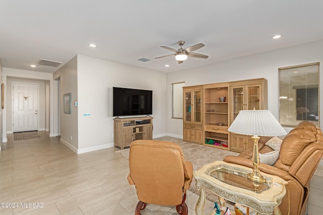 living room with ceiling fan