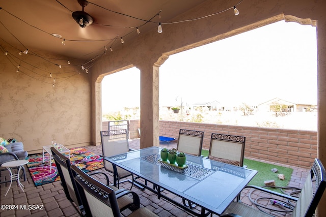 view of patio / terrace featuring fence and outdoor dining space