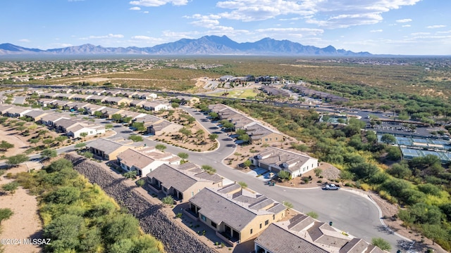 drone / aerial view with a residential view and a mountain view