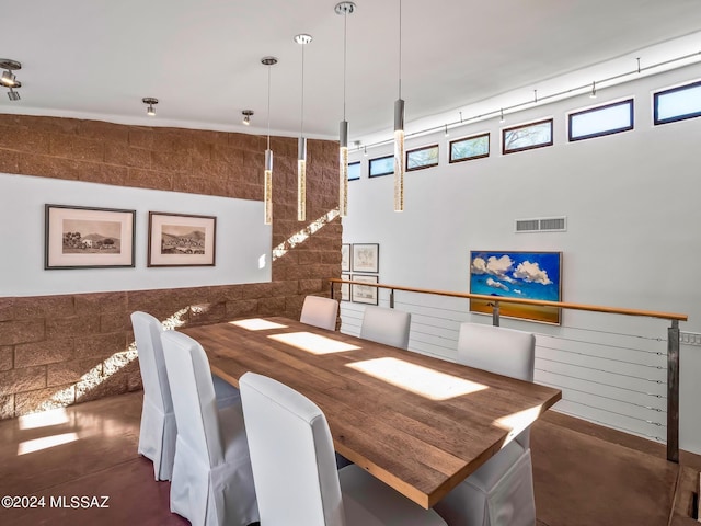 dining room featuring concrete floors
