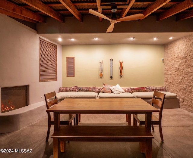 dining room with a ceiling fan, recessed lighting, concrete floors, and beam ceiling